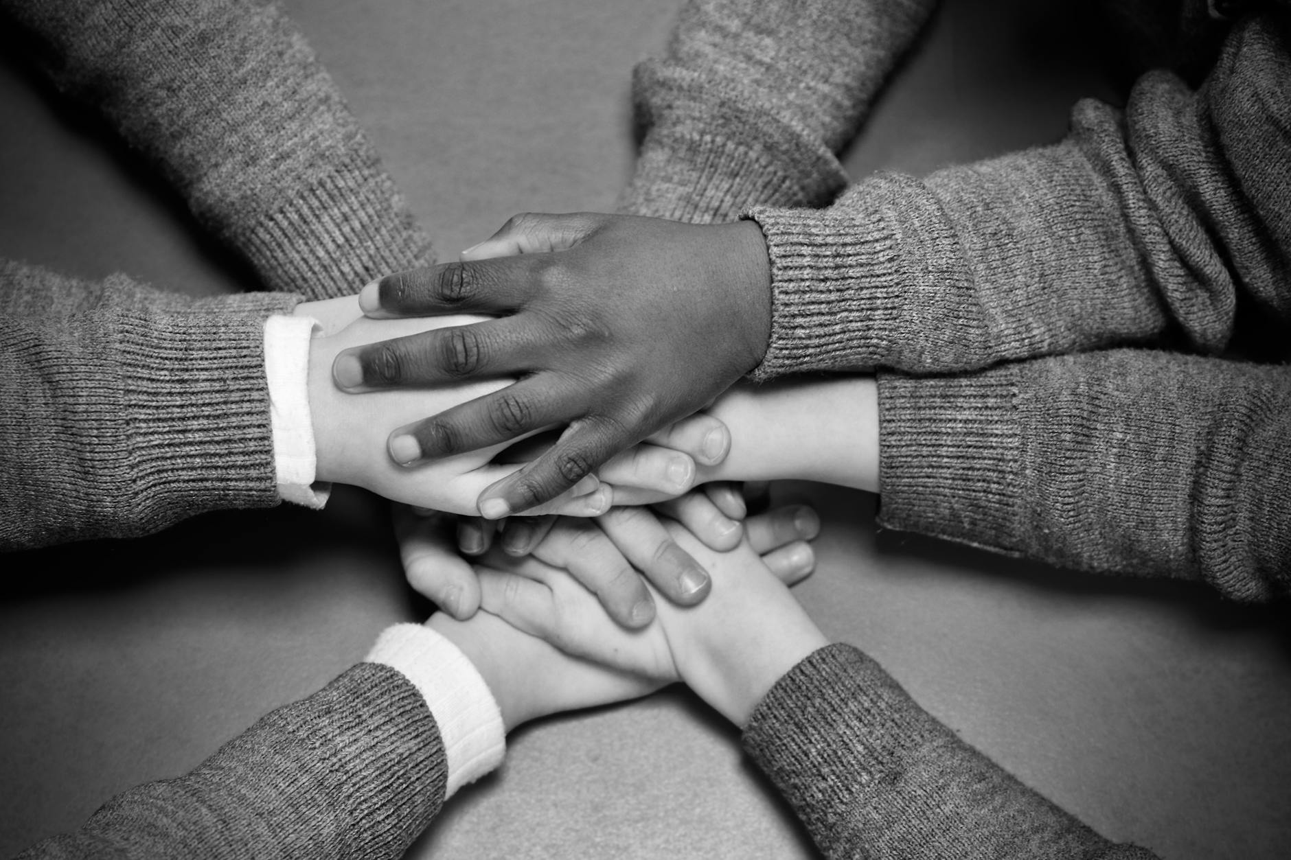 children huddling over table