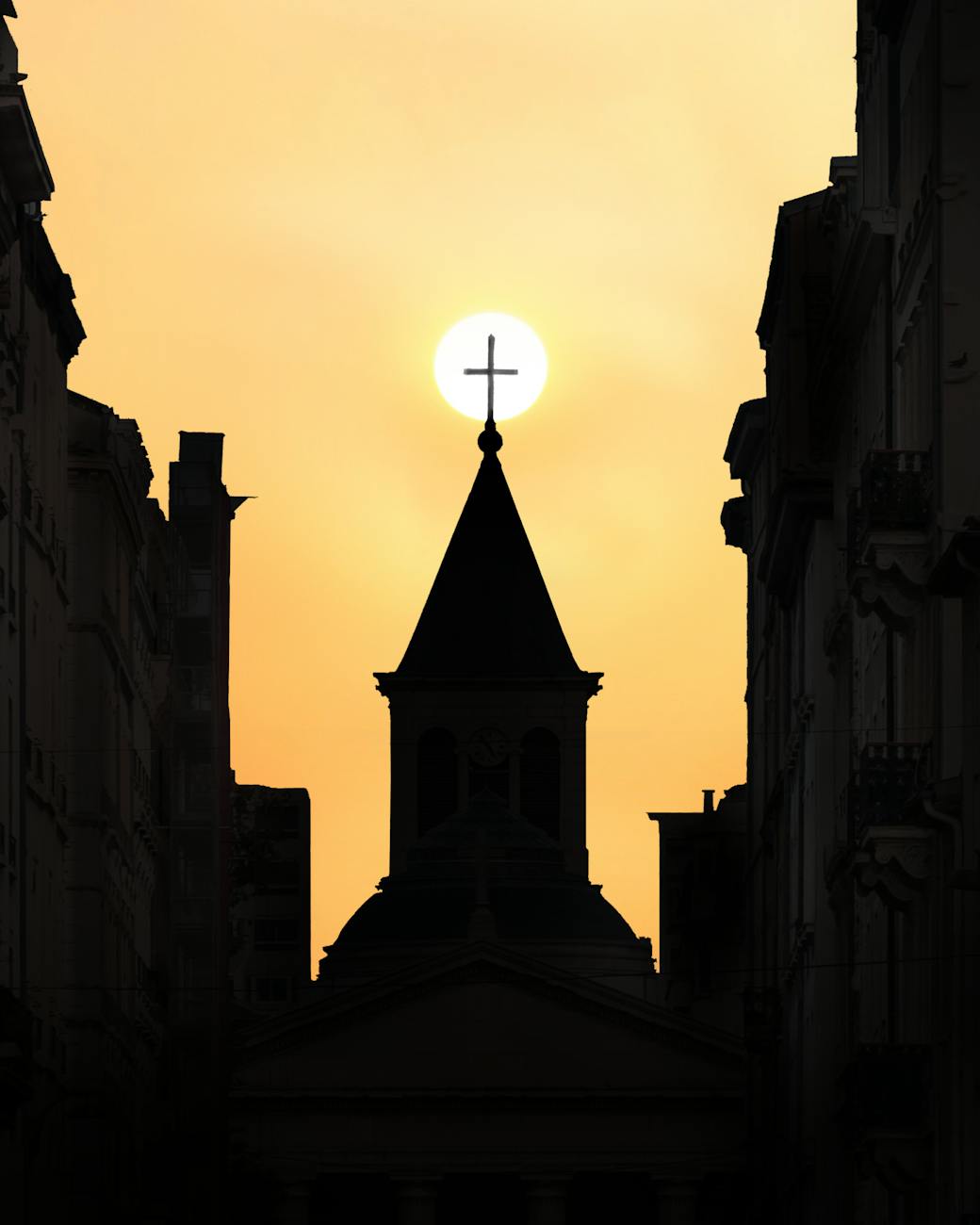 silhouette of buildings and church